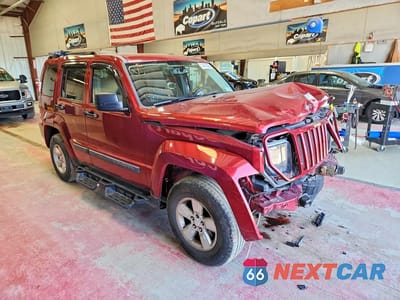 Czwarte zdjęcie samochodu z boku: 2012 JEEP LIBERTY SPORT VIN:1C4PJMAK7CW109768 - miniatura