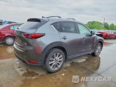 Trzecie zdjęcie samochodu z tyłu: 2021 MAZDA CX-5 GRAND TOURING RESERVE VIN:JM3KFBAY0M0355478 - miniatura
