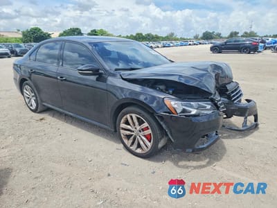 Czwarte zdjęcie samochodu z boku: 2019 VOLKSWAGEN PASSAT WOLFSBURG VIN:1VWLA7A3XKC010528 - miniatura