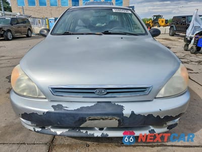 Piąte zdjęcie samochodu w środku: 2002 KIA RIO BASE VIN:KNADC123X26198833 - miniatura