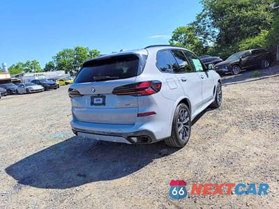 Czwarte zdjęcie samochodu z boku: 2026 BMW X5 XDRIVE40I VIN:5UX23EU03T9345528 - miniatura