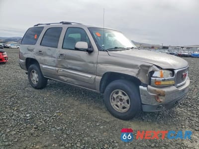 Czwarte zdjęcie samochodu z boku: 2002 GMC YUKON VIN:1GKEC13T12R223353 - miniatura
