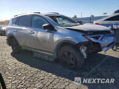 Czwarte zdjęcie samochodu z boku: 2016 TOYOTA RAV4 LE VIN:2T3BFREV5GW496886 - miniatura