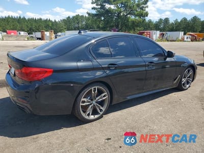 Trzecie zdjęcie samochodu z tyłu: 2020 BMW M550XI VIN:WBAJS7C05LCD53856 - miniatura