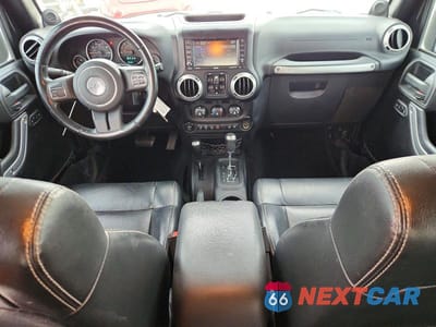 Zdjęcie 8 z 14 samochodu: 2012 JEEP WRANGLER UNLIMITED SAHARA VIN:1C4BJWEG8CL184802 - miniatura