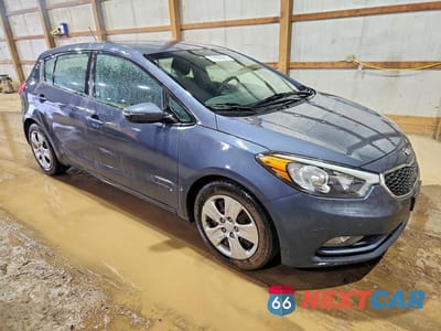 Czwarte zdjęcie samochodu z boku: 2016 KIA FORTE LX VIN:KNAFK5A84G5622357 - miniatura