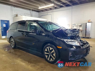 Czwarte zdjęcie samochodu z boku: 2025 HONDA ODYSSEY EXL VIN:5FNRL6H60SB081242 - miniatura