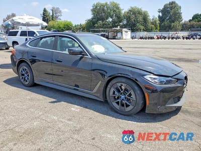 Czwarte zdjęcie samochodu z boku: 2024 BMW I4 EDRIVE 35 VIN:WBY43AW03RFT38250 - miniatura