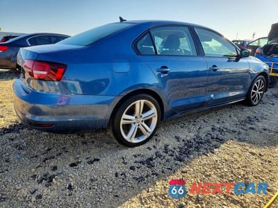 Trzecie zdjęcie samochodu z tyłu: 2016 VOLKSWAGEN JETTA SE VIN:3VWD67AJXGM345279 - miniatura