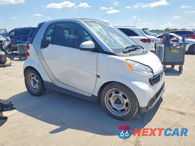 Czwarte zdjęcie samochodu z boku: 2015 SMART FORTWO PURE VIN:WMEEJ3BA1FK799182 - miniatura