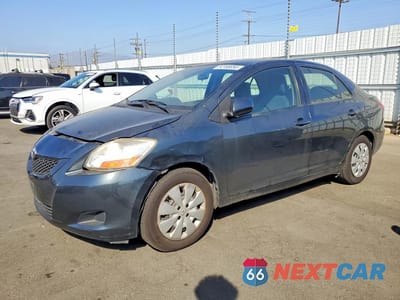 2010 TOYOTA YARIS BASE JTDBT4K30A1392083 - główne zdjęcie licytacji z USA - miniatura