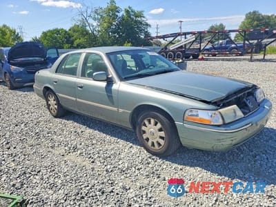 Czwarte zdjęcie samochodu z boku: 2005 MERCURY GRAND MARQUIS LS VIN:2MEHM75W45X643519 - miniatura