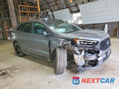 Czwarte zdjęcie samochodu z boku: 2022 FORD EDGE ST VIN:2FMPK4AP1NBA63962 - miniatura