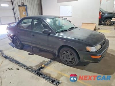 Czwarte zdjęcie samochodu z boku: 1993 TOYOTA COROLLA BASE VIN:2T1AE04E6PC014688 - miniatura
