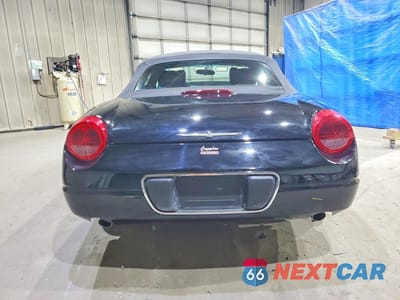 Zdjęcie 6 z 13 samochodu: 2002 FORD THUNDERBIRD VIN:1FAHP60A12Y119700 - miniatura