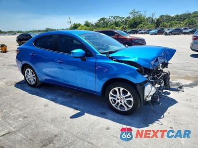 Czwarte zdjęcie samochodu z boku: 2016 SCION IA BASE VIN:3MYDLBZV2GY146162 - miniatura