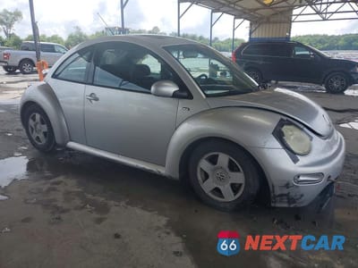 Czwarte zdjęcie samochodu z boku: 2001 VOLKSWAGEN NEW BEETLE GLS SPORT VIN:3VWED21C51M477923 - miniatura