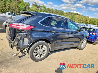 Trzecie zdjęcie samochodu z tyłu: 2024 FORD EDGE TITANIUM VIN:2FMPK4K99RBA31914 - miniatura