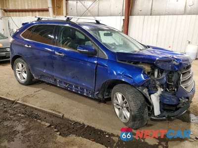 Czwarte zdjęcie samochodu z boku: 2015 FORD EDGE SEL VIN:2FMTK4J80FBC09759 - miniatura