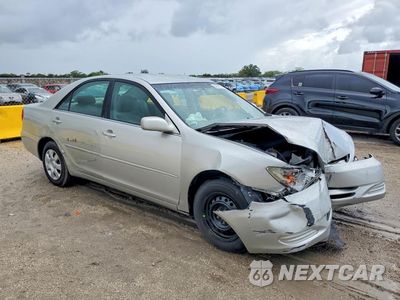 Czwarte zdjęcie samochodu z boku: 2004 TOYOTA CAMRY LE VIN:4T1BE32K94U804298 - miniatura