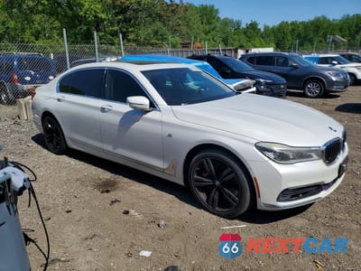 Czwarte zdjęcie samochodu z boku: 2016 BMW 750 XI VIN:WBA7F2C51GG419358 - miniatura