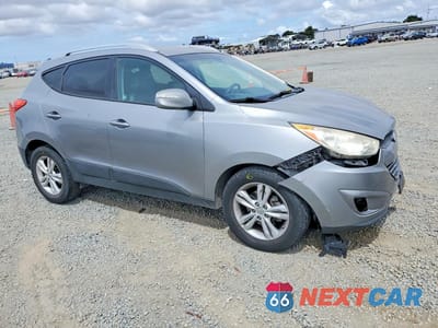 Czwarte zdjęcie samochodu z boku: 2013 HYUNDAI TUCSON GLS VIN:KM8JU3AC2DU556081 - miniatura