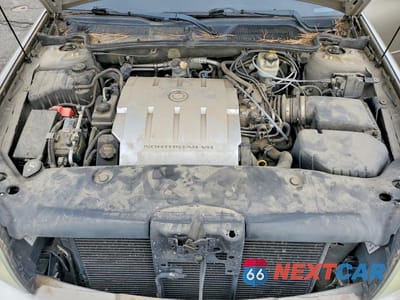 Zdjęcie 11 z 12 samochodu: 2004 CADILLAC DEVILLE DHS VIN:1G6KE54Y34U119783 - miniatura
