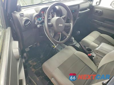 Zdjęcie 8 z 12 samochodu: 2010 JEEP WRANGLER SPORT VIN:1J4AA2D11AL196699 - miniatura