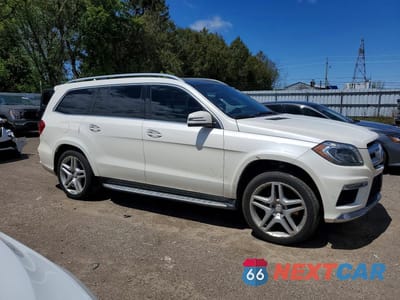Czwarte zdjęcie samochodu z boku: 2014 MERCEDES-BENZ GL 350 BLUETEC VIN:4JGDF2EEXEA425500 - miniatura