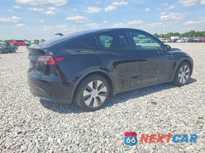 Trzecie zdjęcie samochodu z tyłu: 2023 TESLA MODEL Y VIN:7SAYGAEE3PF770202 - miniatura