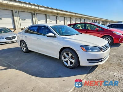 Czwarte zdjęcie samochodu z boku: 2012 VOLKSWAGEN PASSAT SE VIN:1VWBP7A34CC059476 - miniatura
