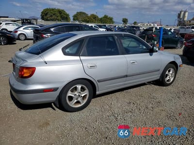 Trzecie zdjęcie samochodu z tyłu: 2001 HYUNDAI ELANTRA GL/VE VIN:KMHDN55D31U027324 - miniatura