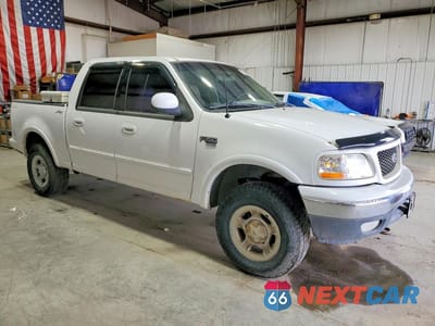 Czwarte zdjęcie samochodu z boku: 2001 FORD F150 SUPERCREW VIN:1FTRW08L81KD55265 - miniatura