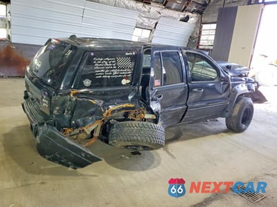 Trzecie zdjęcie samochodu z tyłu: 2001 JEEP GRAND CHEROKEE LAREDO VIN:1J4GW48S51C731382 - miniatura