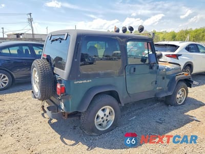 Trzecie zdjęcie samochodu z tyłu: 1995 JEEP WRANGLER VIN:1J4FY19P5SP266062 - miniatura