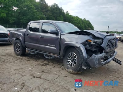 Czwarte zdjęcie samochodu z boku: 2023 TOYOTA TACOMA TRD SPORT VIN:3TYCZ5AN5PT136436 - miniatura