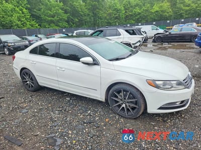 Czwarte zdjęcie samochodu z boku: 2015 VOLKSWAGEN CC EXECUTIVE VIN:WVWRP7AN2FE815415 - miniatura
