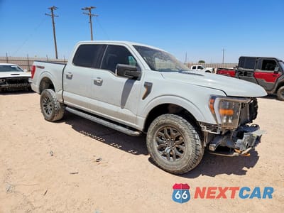 Czwarte zdjęcie samochodu z boku: 2023 FORD F150 SUPERCREW VIN:1FTEW1E81PFD21271 - miniatura
