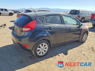 Trzecie zdjęcie samochodu z tyłu: 2013 FORD FIESTA SE VIN:3FADP4EJ2DM159567 - miniatura
