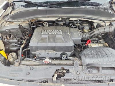 Zdjęcie 11 z 12 samochodu: 2008 HONDA RIDGELINE RT VIN:2HJYK16218H535093 - miniatura