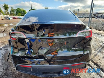 Zdjęcie 6 z 13 samochodu: 2022 TESLA MODEL Y VIN:7SAYGDEE1NF447829 - miniatura