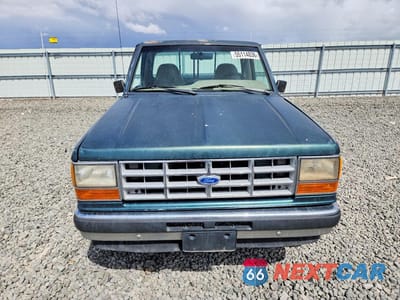 Piąte zdjęcie samochodu w środku: 1991 FORD RANGER VIN:1FTCR11X7MPA10817 - miniatura