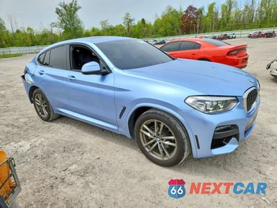 Czwarte zdjęcie samochodu z boku: 2020 BMW X4 XDRIVE30I VIN:5UX2V1C05L9D00632 - miniatura