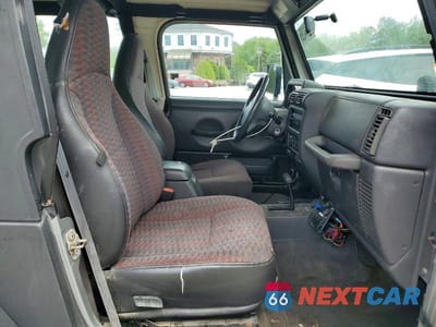 Zdjęcie 10 z 12 samochodu: 2000 JEEP WRANGLER / TJ SPORT VIN:1J4FA49S2YP754758 - miniatura