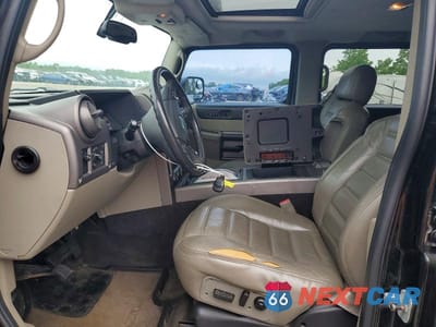 Zdjęcie 7 z 13 samochodu: 2004 HUMMER H2 VIN:5GRGN23U24H112847 - miniatura