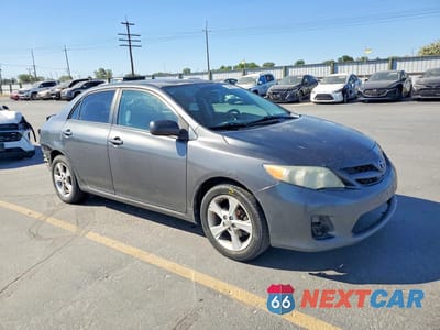 Czwarte zdjęcie samochodu z boku: 2011 TOYOTA COROLLA LE VIN:2T1BU4EE2BC595502 - miniatura