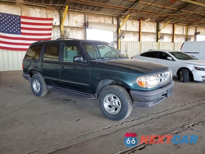 Czwarte zdjęcie samochodu z boku: 1997 FORD EXPLORER VIN:1FMDU34X3VZA35922 - miniatura