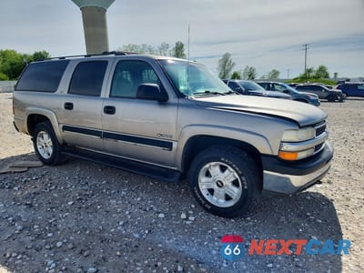 Czwarte zdjęcie samochodu z boku: 2001 CHEVROLET SUBURBAN K1500 VIN:3GNFK16T11G115481 - miniatura