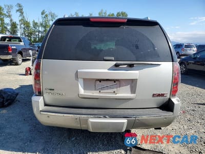 Zdjęcie 6 z 13 samochodu: 2010 GMC YUKON DENALI VIN:1GKUKEEF7AR136164 - miniatura