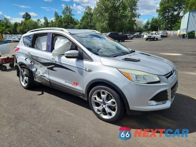 Czwarte zdjęcie samochodu z boku: 2016 FORD ESCAPE TITANIUM VIN:1FMCU0J99GUA04139 - miniatura